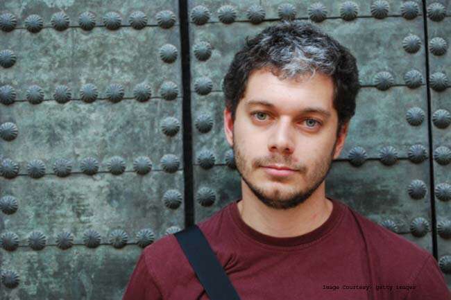 young man with early grey hair